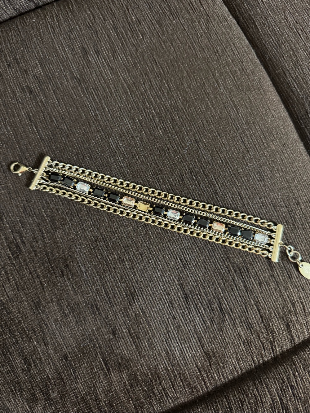 Nicole Miller Gold-Tone Multi-Strand Bracelet with Black and Clear Accents